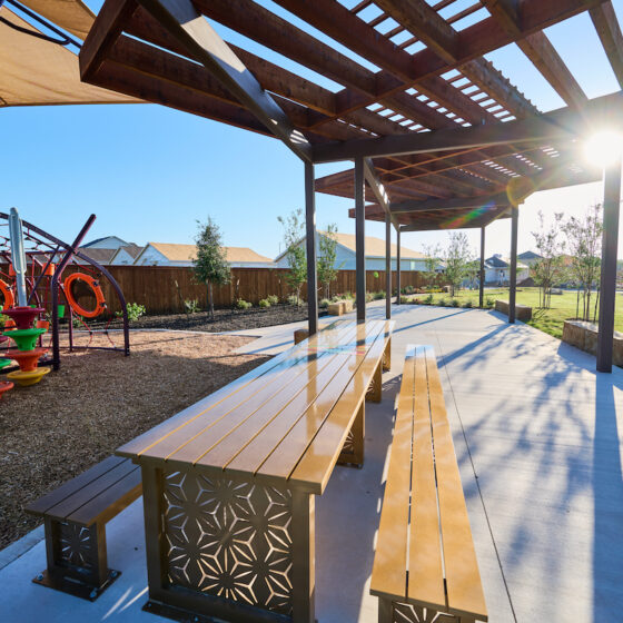 The sun rays shine through the pavilion at Ana Park on the Southside at VIDA San Antonio.