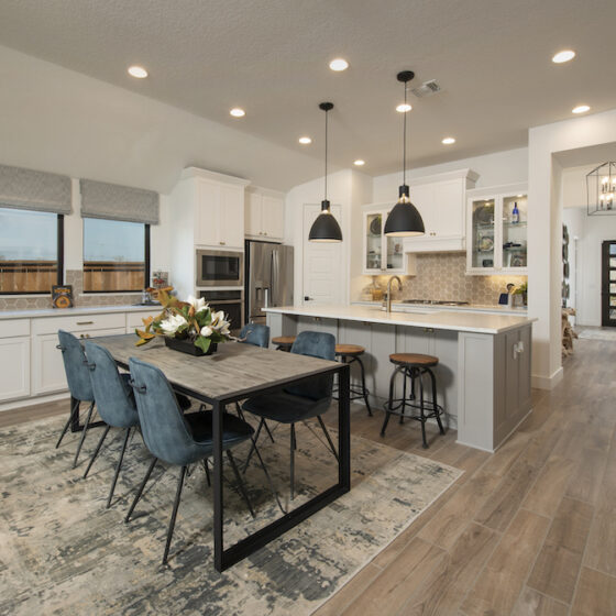 A beautifully upgraded kitchen with natural lighting.