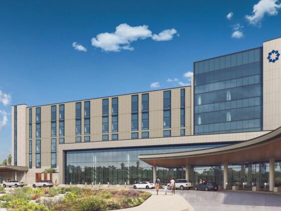 A modern hospital with blue glass envisioned for the new Palo Alto Hospital on the Southside of San Antonio