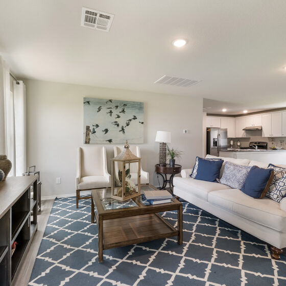 Neutral living room with pops of blue