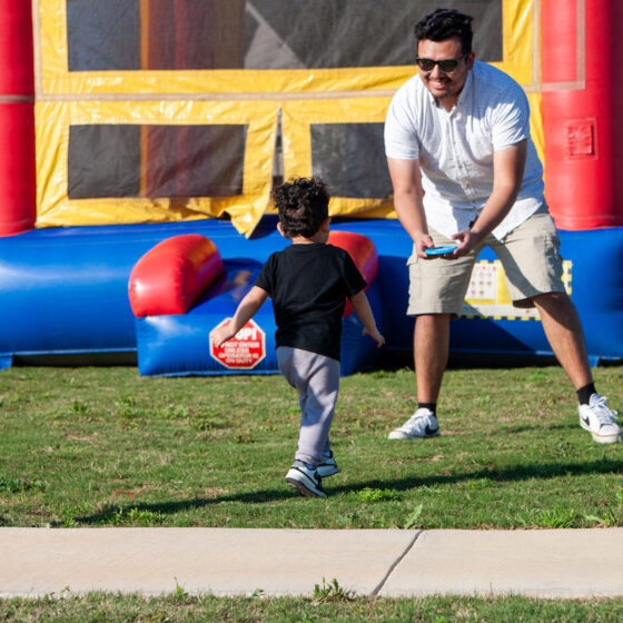 Family Playing in the Park at VIDA San Antonio