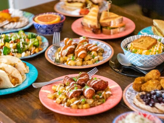 A table spread of various vegan eats.