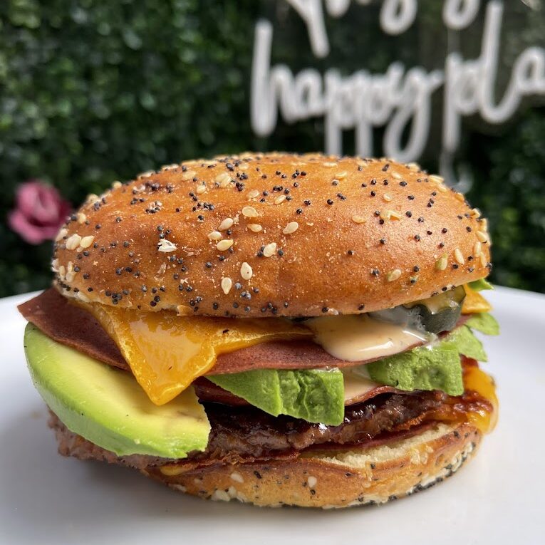 Burger with avocado with cheese