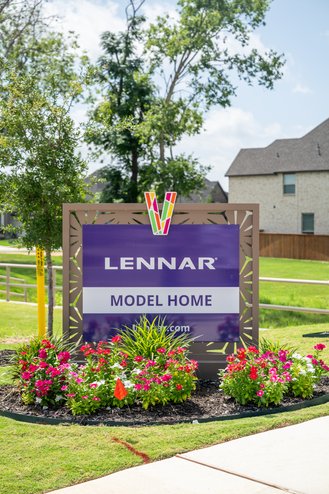 A bright purple sign for Lennar Homes