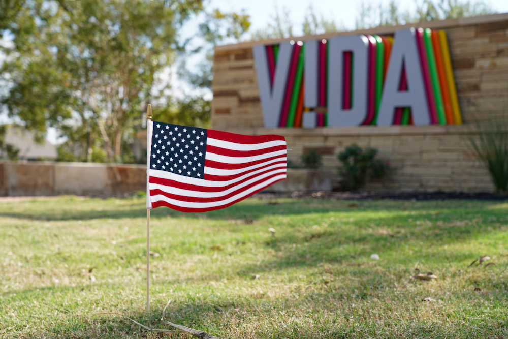 An American flag on a lawn